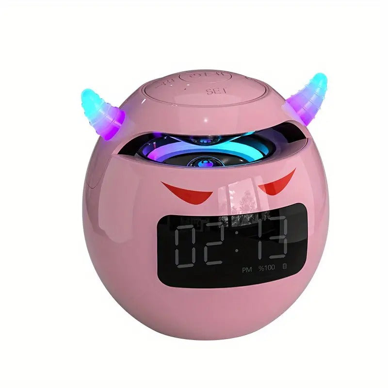 Růžový reproduktor s hodinama